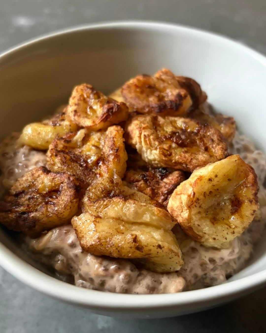 Roasted banana chia porridge topped with cinnamon banana